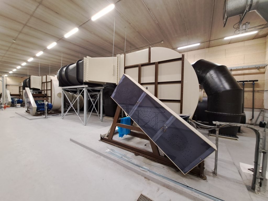 Het gebruik van tijdelijke ventilatoren als toepassing voor het verzekeren van biologische luchtbehandeling bij Delfluent Services